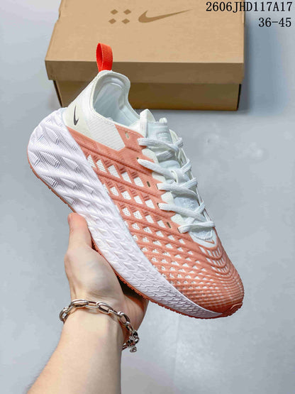 Nike Ava Rover Low-Top Sneakers in White and Coral