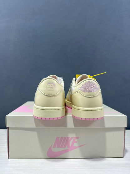 Rear view of the pair showing cream heel panels and embroidered heel graphics.