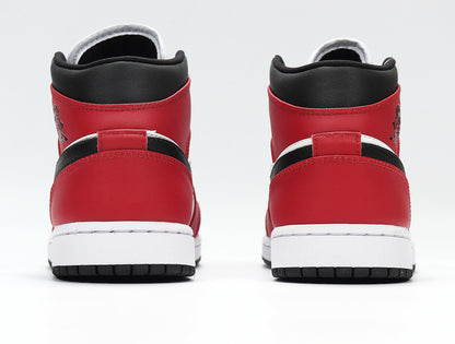Rear view showing the red heel panels, black collars, white midsoles, and black outsoles