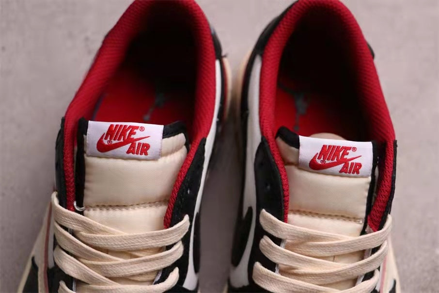Top view showing red padded collars, cream laces, and tongue labels with Air branding.