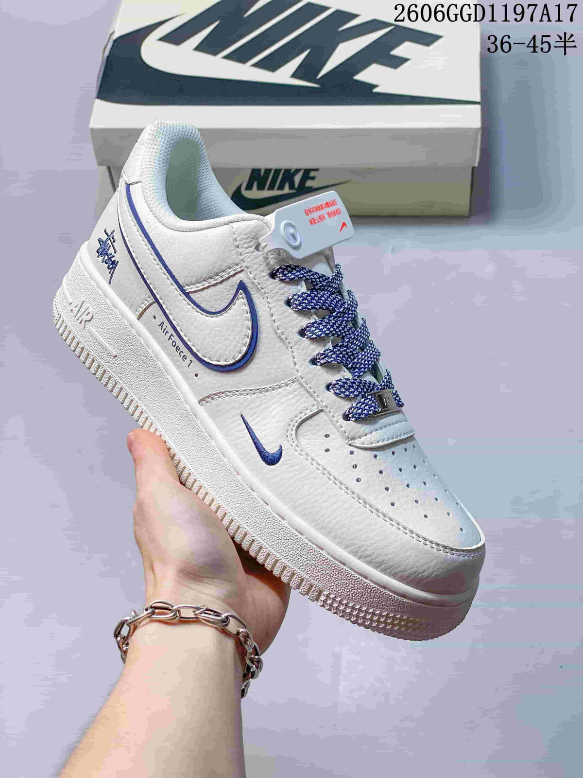 Nike Air Force 1 Low x Stüssy White and Navy Sneakers
