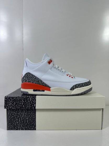 Side profile of the white and grey high-top sneaker with red heel detailing and a visible heel air window.