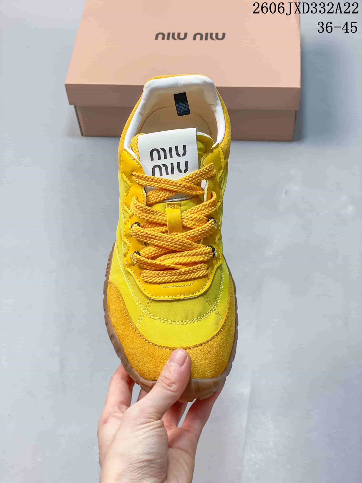 Miu Miu Tyre Low-Top Sneakers in Yellow