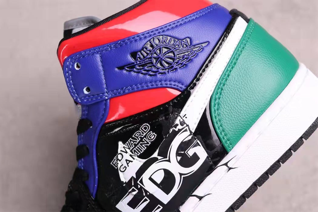 Close-up of the blue ankle panel with Jordan wing branding, green heel panel, and Edward Gaming EDG graphics.