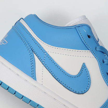 Close-up of the blue and white side panel, Swoosh branding, stitching, and textured white midsole.