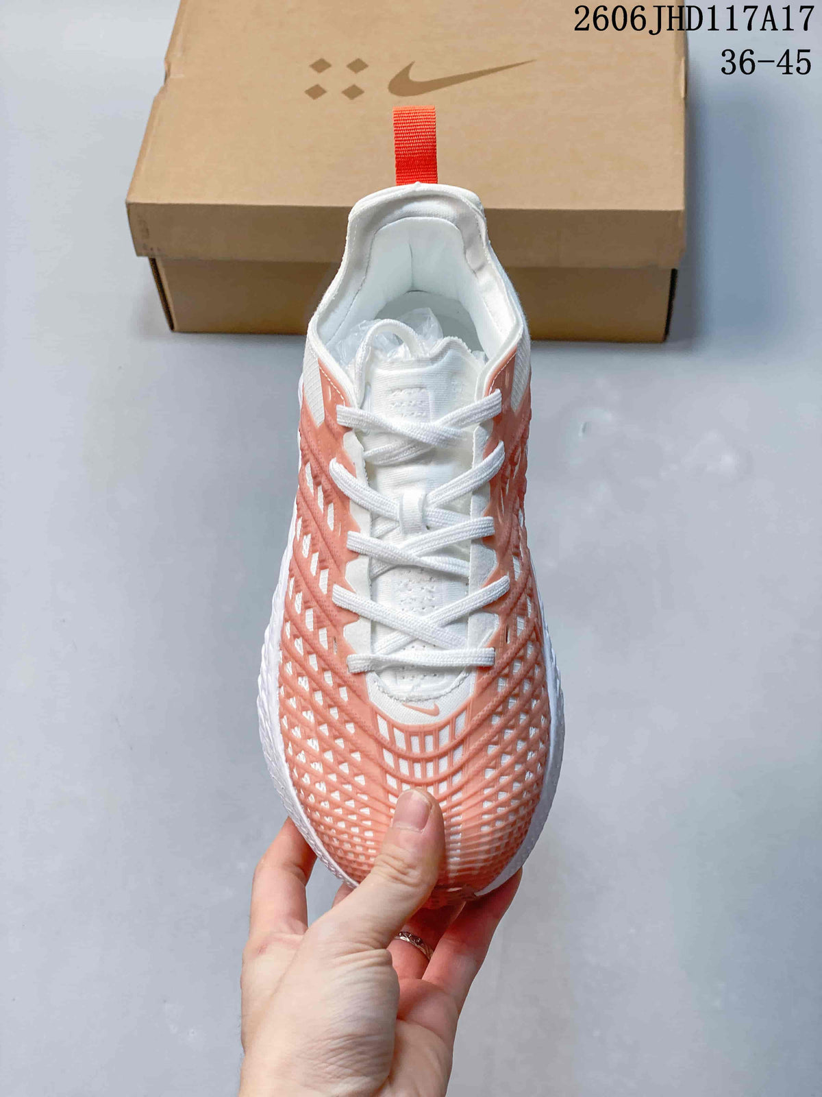 Nike Ava Rover Low-Top Sneakers in White and Coral