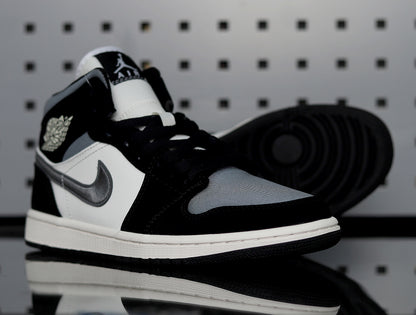 Front three-quarter view of one sneaker beside its black rubber outsole.