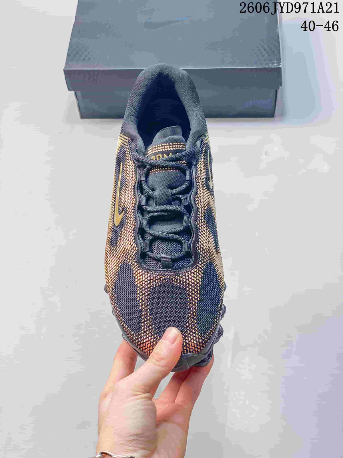 Nike Air Liquid Max Running Shoes in Black and Gold
