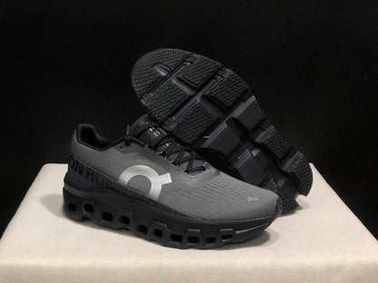 On Cloudmonster 2 Running Shoes in Gray and Black