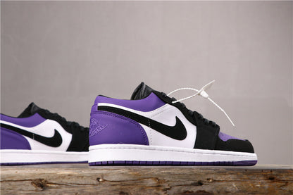 Profile view of the purple, white, and black low-top sneaker with a white midsole and purple outsole.