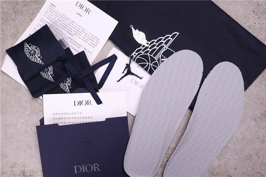 Displayed accessories include branded-looking packaging, documents, pouches and removable insoles.