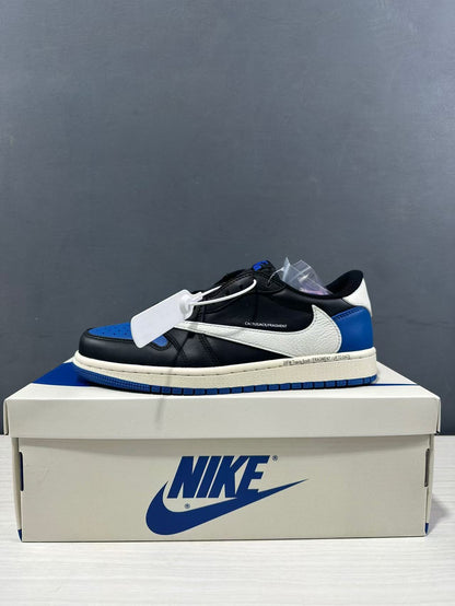 Side profile of the sneaker with black panels, white Swoosh, blue heel, and blue outsole.