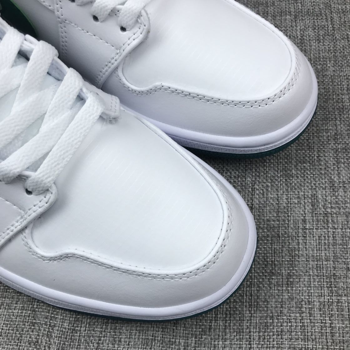 Close-up view of the white toe boxes and lace sections.