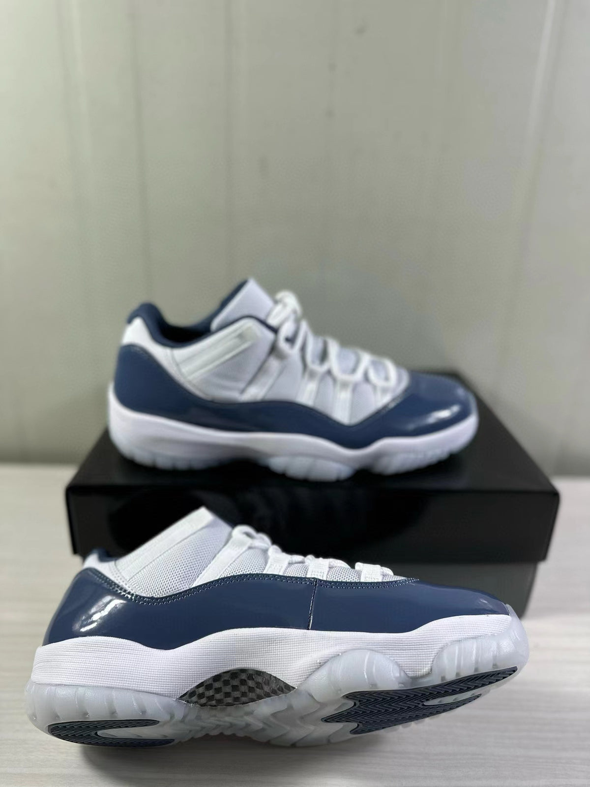 Angled view of the sneakers showing the side and outsole