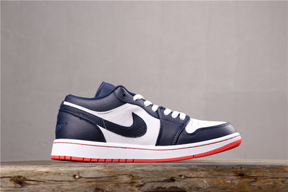 Side profile of the low-top sneaker showing the dark blue Swoosh, white side panel, and red outsole.