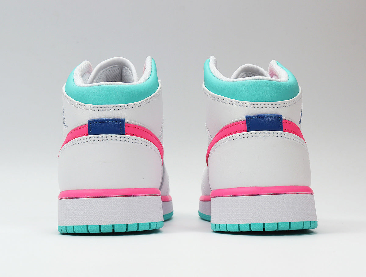 Rear view showing white heel panels, pink overlays, aqua collars, and aqua outsoles.