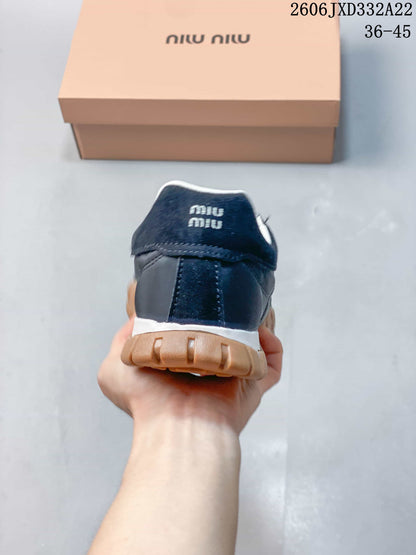 Miu Miu Tyre Low-Top Sneakers in Gray and Navy