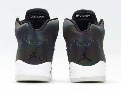 Rear view showing the heels and white midsoles of the sneakers.