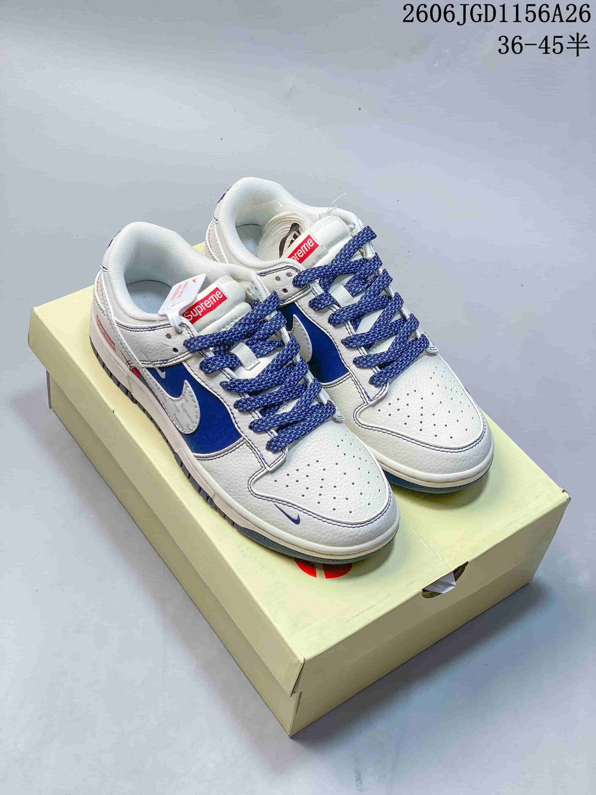 Nike Dunk Low White and Blue Monogram Sneakers