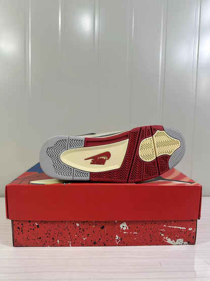 Underside view showing the patterned rubber outsole with red, cream, and gray sections.