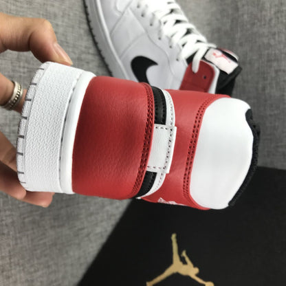 Close-up of the red heel and white collar with visible stitching and black trim.