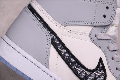 Detailed side view of the grey heel overlay, stitching and patterned Swoosh.