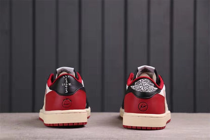 Rear view showing red heel panels, black heel tabs, and branded heel graphics.