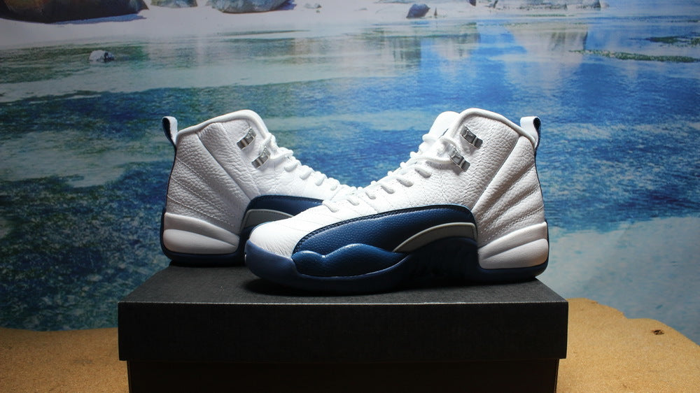Side profile of the pair showing the high-top shape and navy overlays.