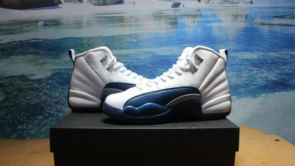 Side profile of the pair showing the high-top shape and navy overlays.