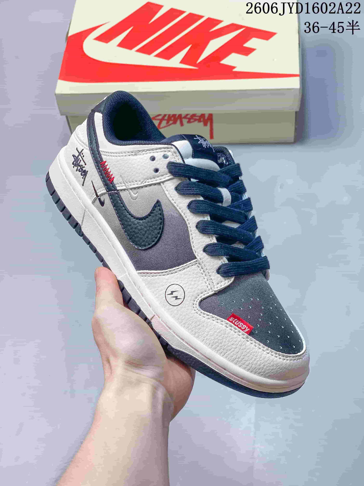 Nike SB Dunk Low Striped White, Blue and Red Sneakers