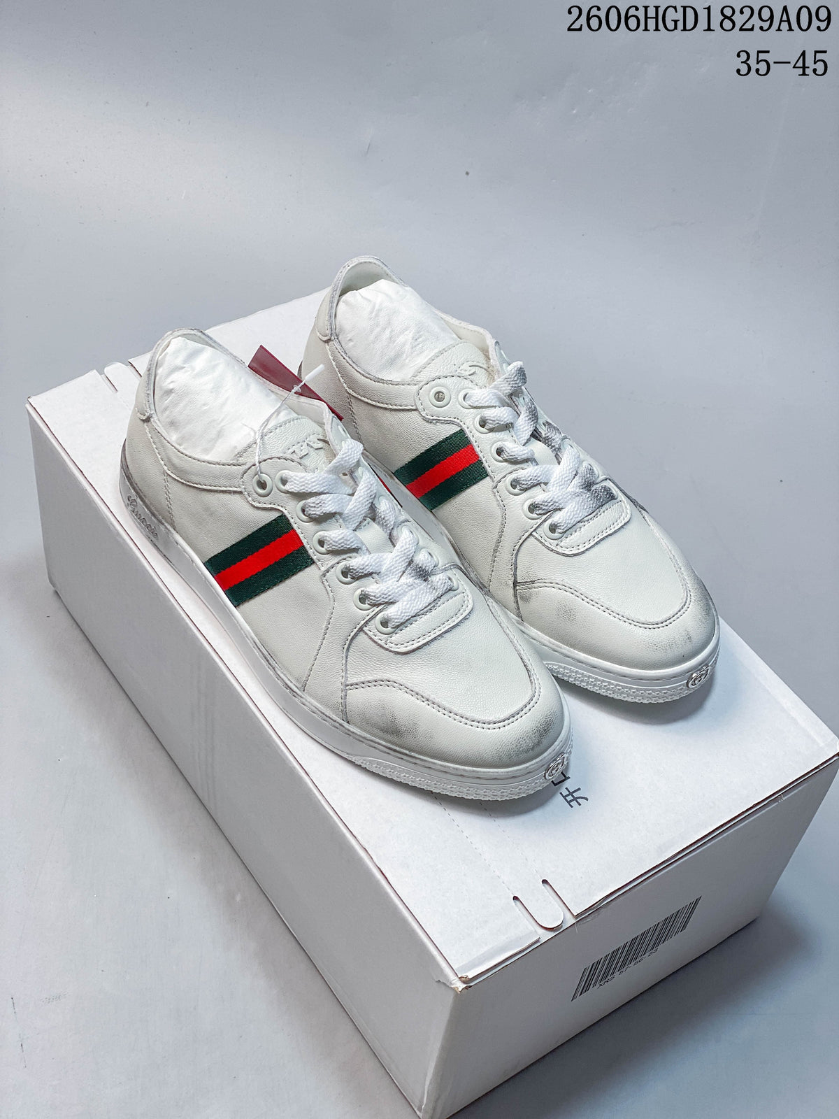 Gucci White Low-Top Sneakers with Red-Green Web Stripe