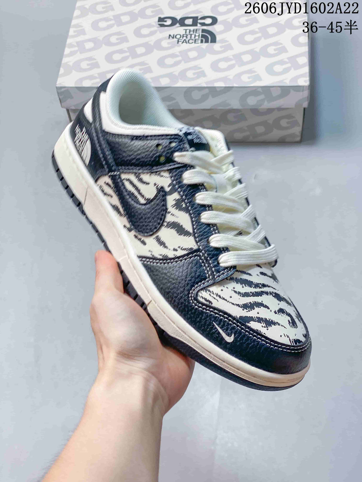 Nike SB Dunk Low Striped Cream and Navy Sneakers