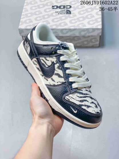 Nike SB Dunk Low Striped Cream and Navy Sneakers