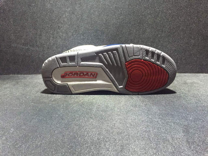 Outsole view showing the gray tread pattern and red circular traction area.