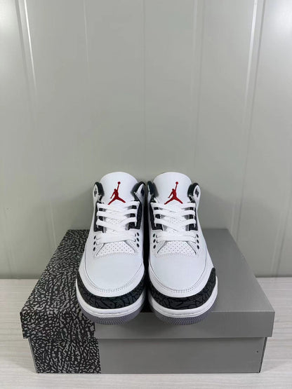 Front view showing white laces, perforated toe boxes, black detailing, and red tongue logos.