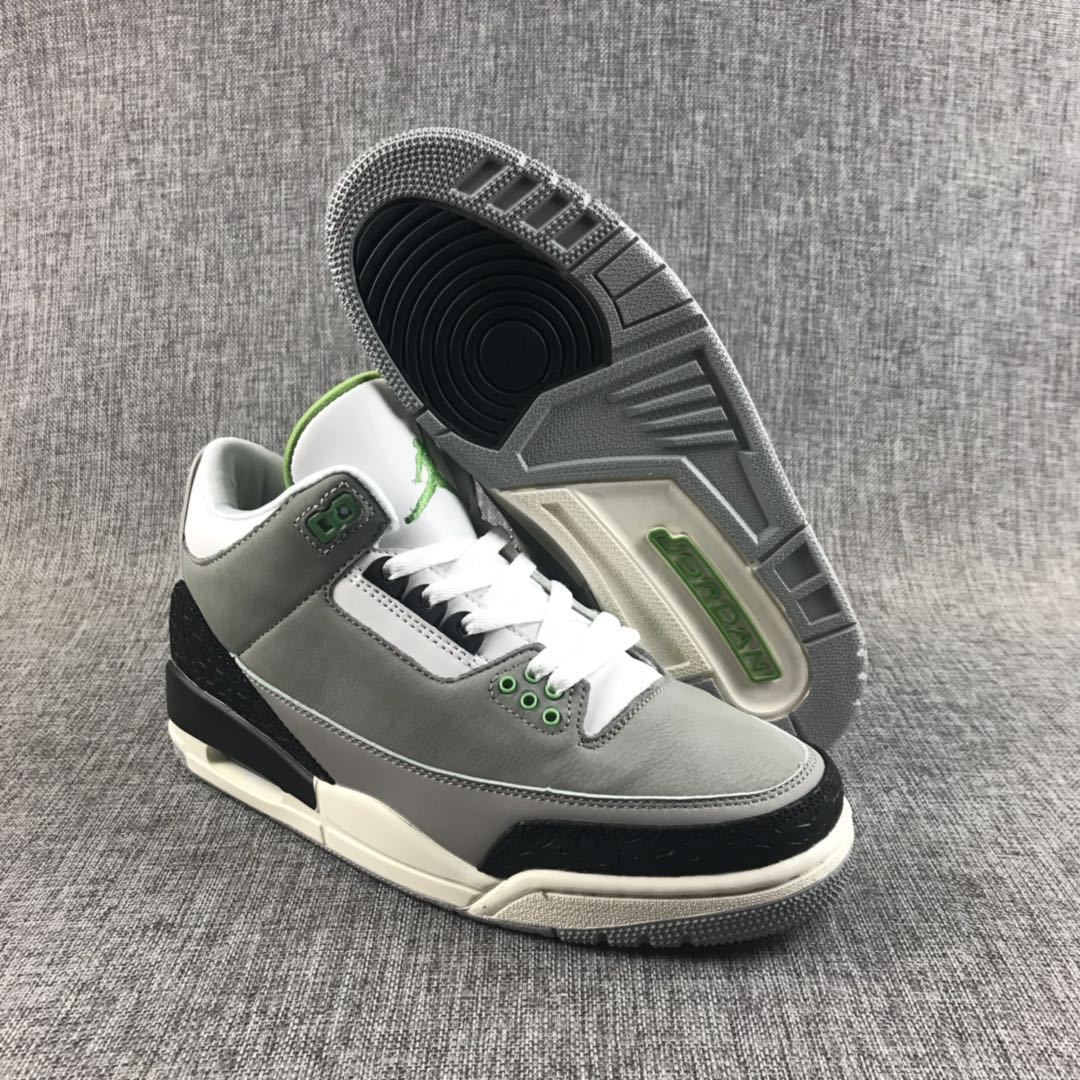 Gray and black Jordan Air Jordan 3 sneaker showing the outsole pattern and visible heel window.
