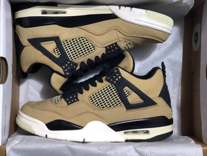 Pair of mushroom-toned Jordan 4 Retro sneakers with black overlays, laces, mesh panels, and contrasting soles inside a box.