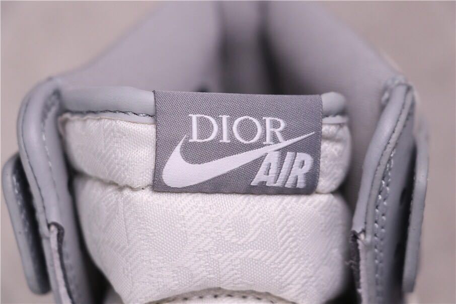 Close-up of the tongue label marked Dior Air.