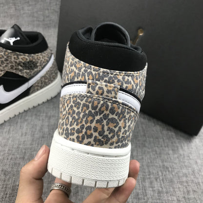 Close rear view showing the leopard-print heel, black padded collar, and white outsole.