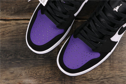 Top view highlighting the perforated purple toe boxes, black laces, and contrasting overlays.