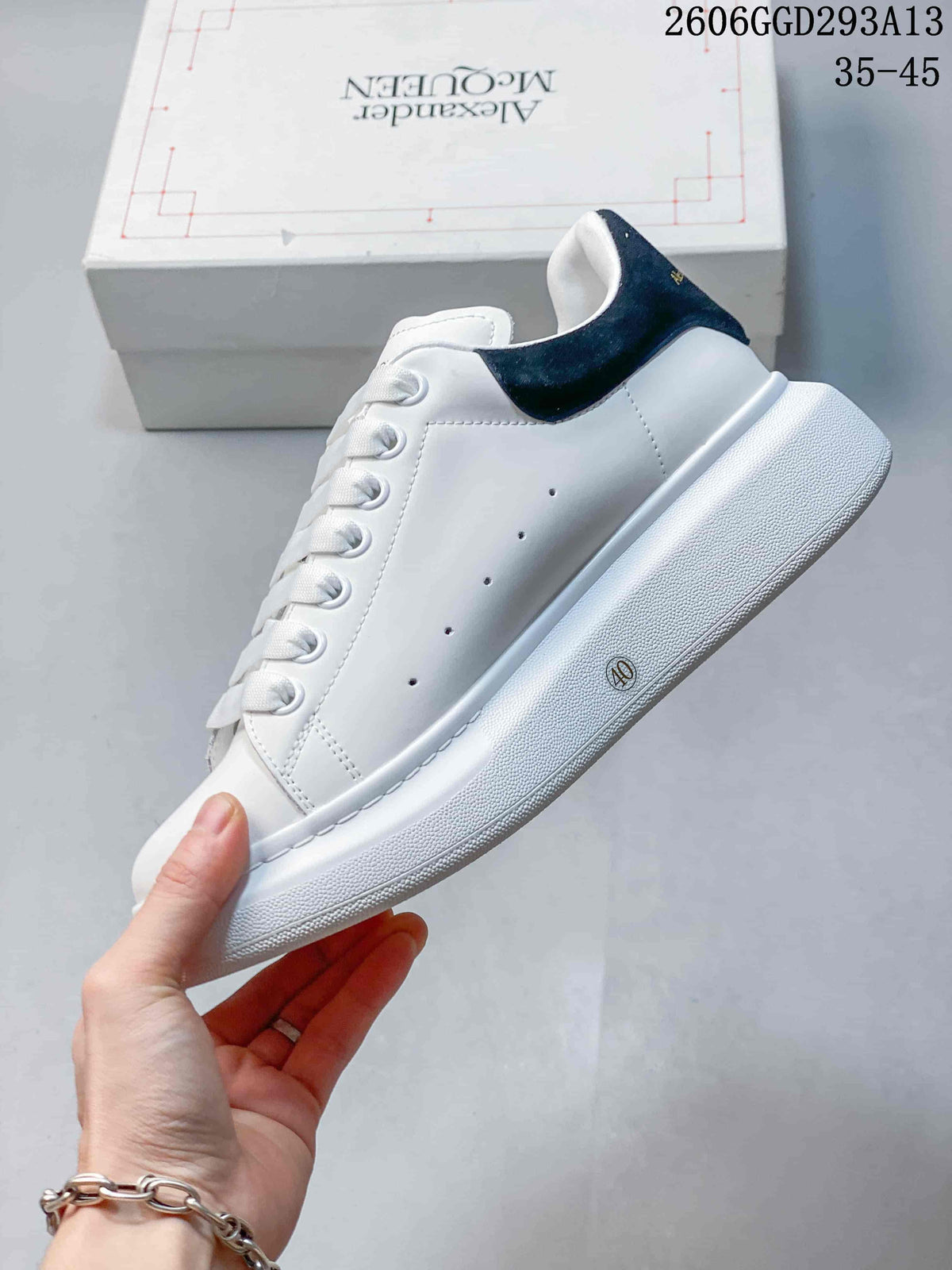 Alexander McQueen White Low-Top Sneakers with Black Heel Tab