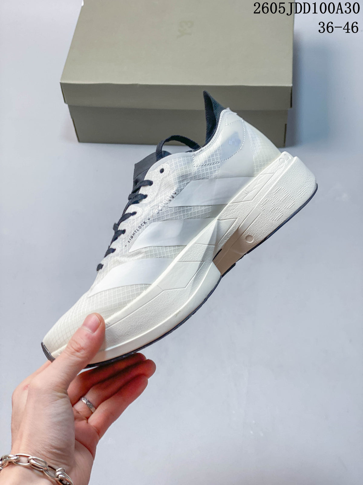 Adidas Adizero Adios Pro 4 Running Shoes, White and Navy