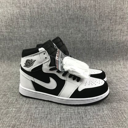 Pair of black-and-white Jordan high-top sneakers with extra white laces