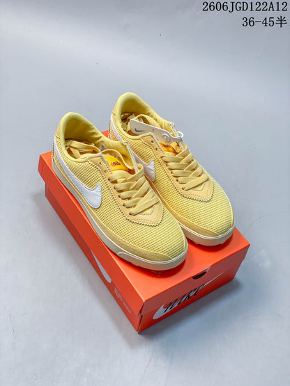Nike Astro Grabber Women's Casual Sneakers in Pink and Yellow