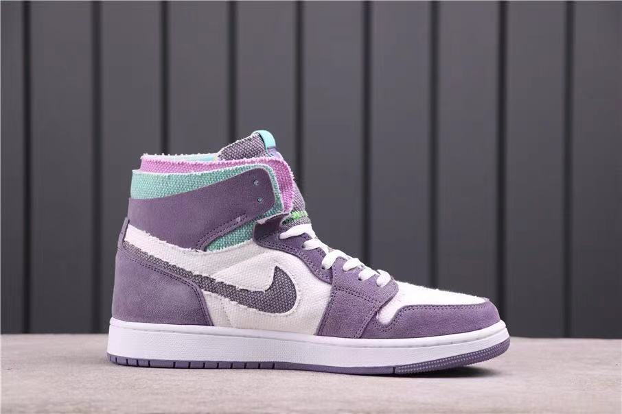 Side profile of one high-top sneaker showing the layered collar, Swoosh and white midsole.