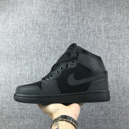 Side profile of a black high-top sneaker showing the tonal side logo and layered panels.