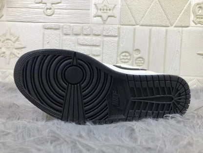 Underside view showing the black rubber outsole with circular forefoot grooves and segmented traction blocks.