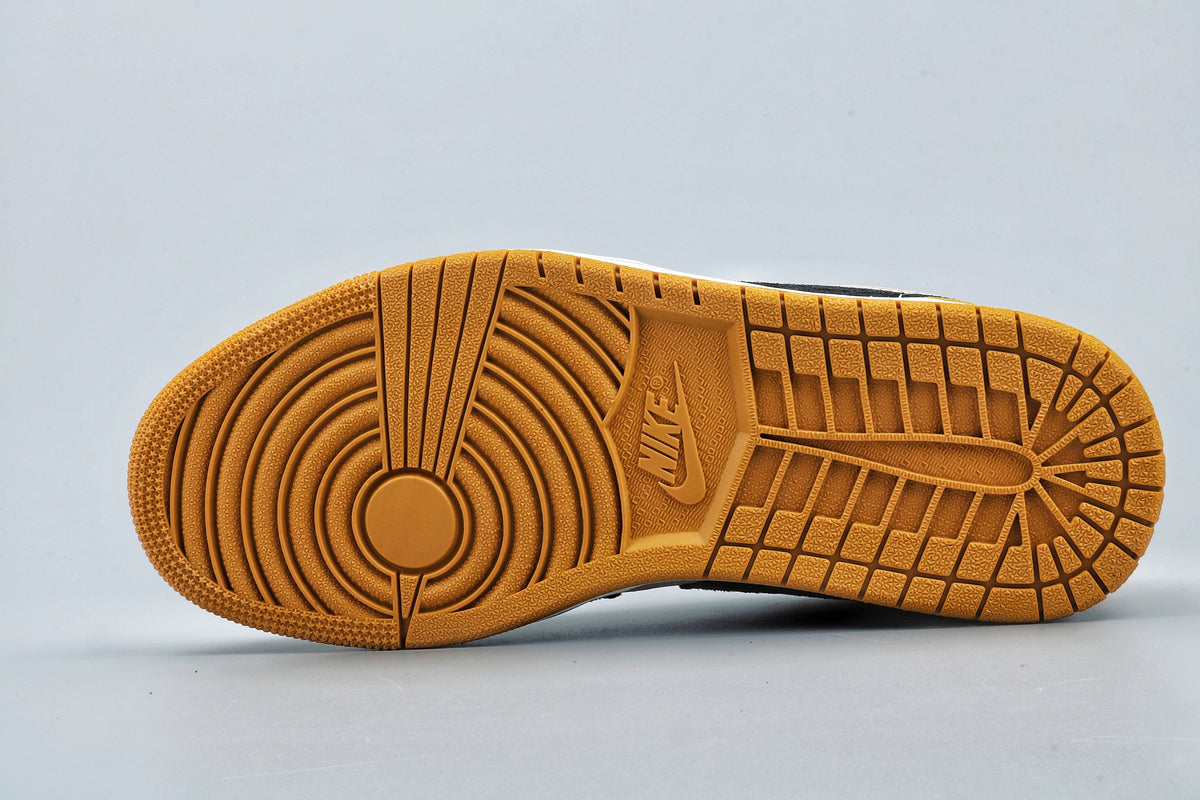 Yellow rubber outsole showing circular forefoot and segmented tread patterns.