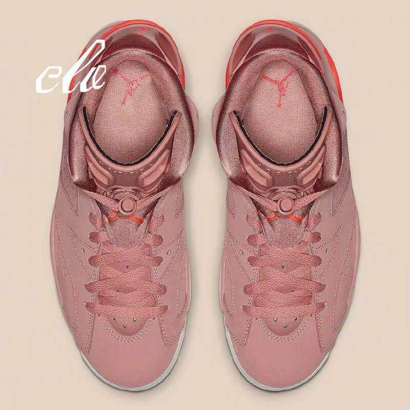 Top-down view of the pair showing the laces, padded tongues, and pink upper.