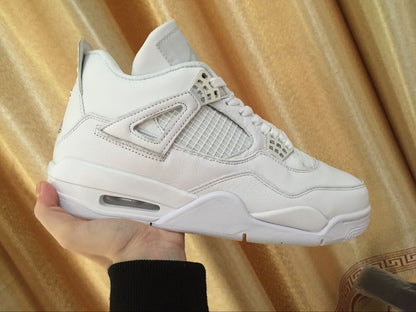 Side profile of a white sneaker showing the ankle collar, mesh panel, layered overlays, and visible midsole window.